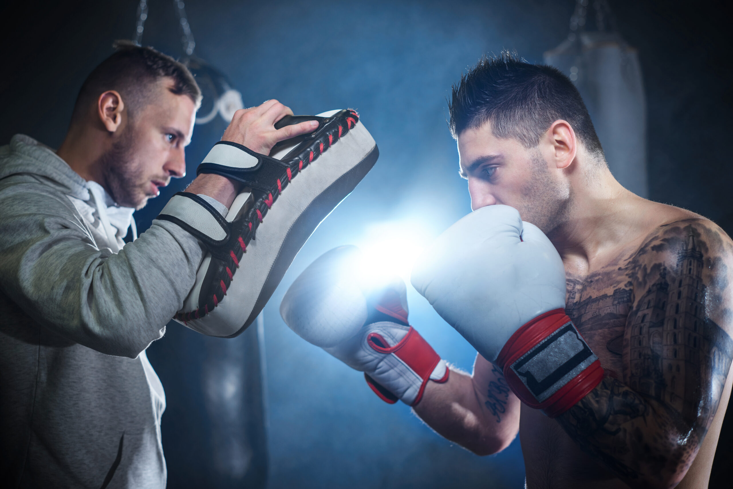 storyblocks male boxer sparring with personal trainer rDUsi1FcM scaled