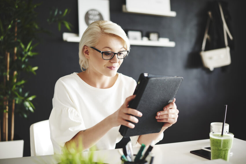 storyblocks woman with eyeglasses using a digital tablet BwaSiJY5f